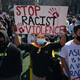 Members and supporters of the Asian-American community attend a “rally against hate” at Columbus Park in New York City on March 21, 2021.